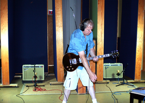 Michael Smitty Smith playing guitar